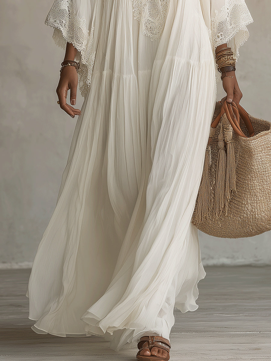 Celia | Vestido largo de chiffón marfil con mangas murciélago