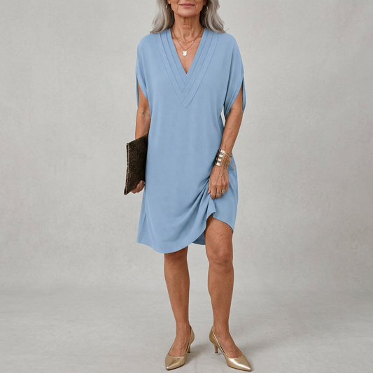 Eva | Vestido elegante con escote en V y falda fluida